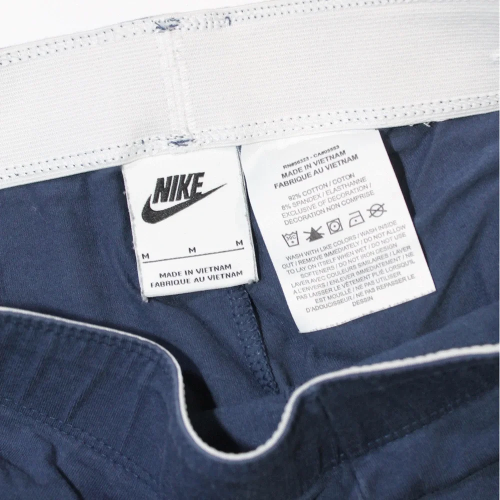 Nike Kids Navy Leggings with Iridescent Logo